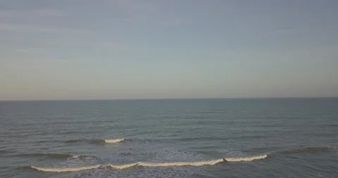 Drone Shot From Ocean to Beach Stock Footage 133539565