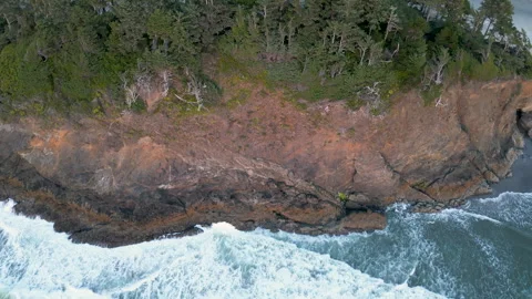 Drone shot of the ocean cliff side of  Proposal rock Stock Footage 249028511