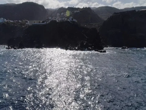 Drone shot of oeanic powerful waves hitting rocks Stock Footage 83869302
