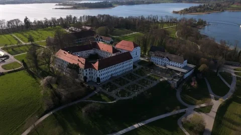 Drone shot of old Augustinian monastery on Herreninsel, Chiemsee lake, Bavaria Stock Footage 316643249