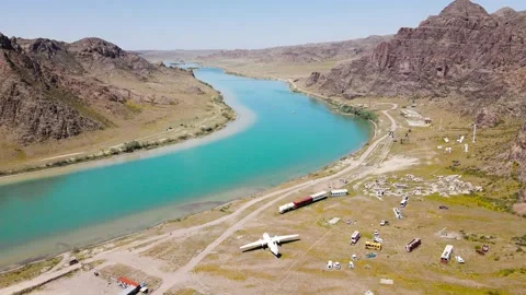 Drone shot of old train dump near river Ili Kazakhstan Stock-Footage 194468889