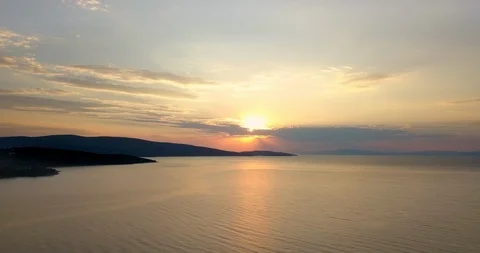 Drone shot of orange colored sunset over the sea Stock Footage 108062974