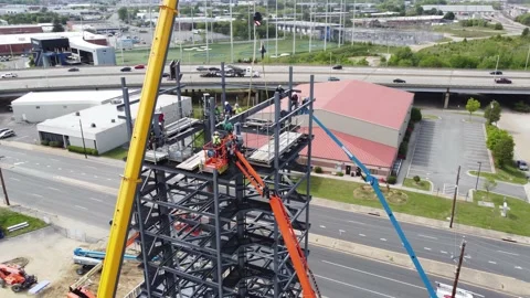 Drone Shot Orbiting Around Tall Steel Building Under Construction Stock Footage 159620190