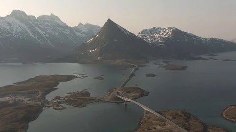 Drone Shot Orbiting Fredvang Bridge Facing Volantstind Mountain In Lofoten Stock Footage 116430132
