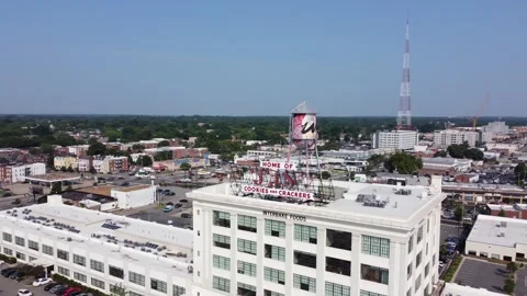 Drone Shot Orbiting Front Of Building With Water Tower On Top Stock Footage 161423878