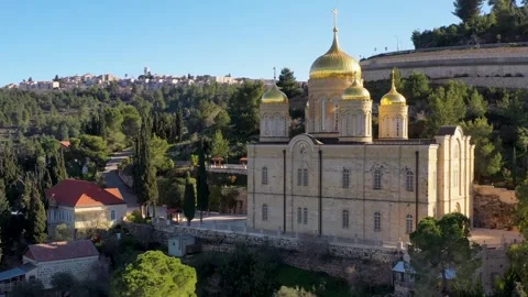 Drone shot orbiting Gorny Convent golden domes in Ein Karem Jerusalem Stock Footage 341507809