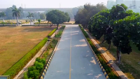 Drone shot outdoor empty corridor in at office garden Stock Footage 219716773