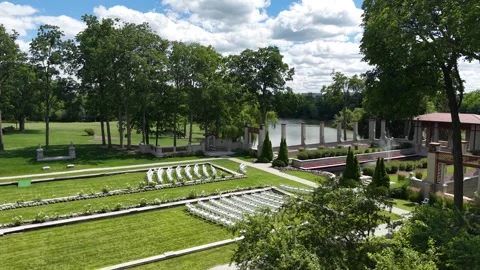 Drone Shot of Outdoor Wedding Settings, White Chairs on Green Garden Grass and Stock Footage 344058211