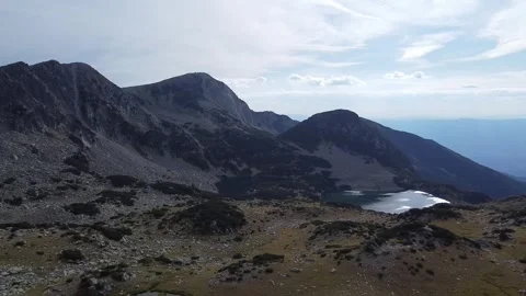 Drone Shot Over Alpine Lakes and Rugged Pirin Mountain Range, Bulgaria Stock Footage 332012445