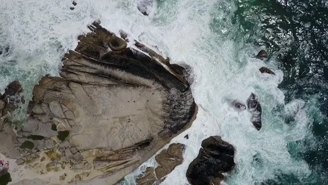 Drone shot over boulders in the atlantic ocean Stock Footage