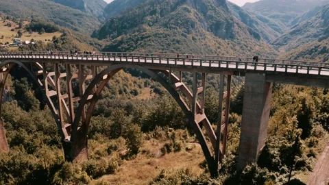 Drone shot over the bridge in the Tara Canyon Stock Footage 231798266