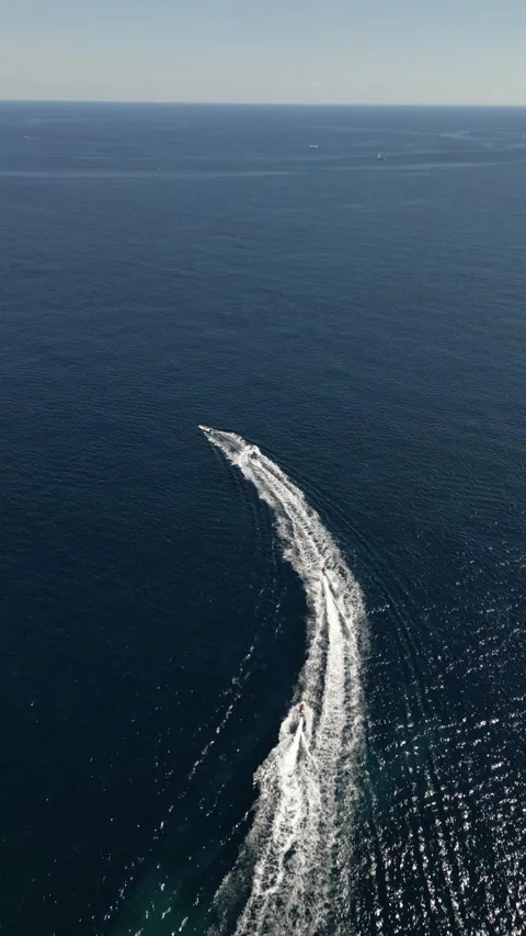 Drone Shot over Cala Murada with cenital view of Watersky, Mallorca, Spain Stock Footage 254579709