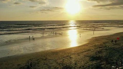 Drone shot over Echo Beach during sunset in Canggu, Bali Foto stock