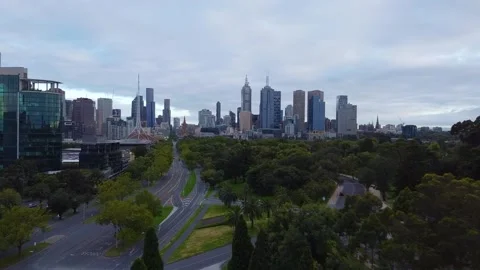 Drone shot over the eerie Melbourne city streets during the coronavirus Stock Footage