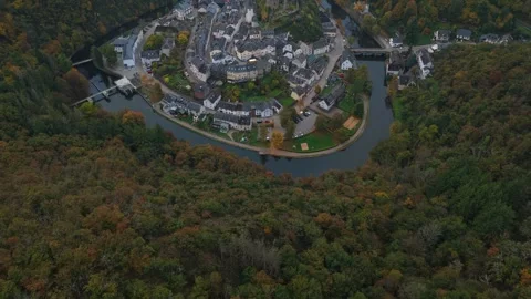Drone shot over Esch sur Sure, scenic old town in Luxembourg’s north. Stock Footage 321422864