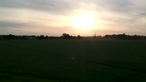 Drone shot, over a german field, dawn, sunset, horizon 스톡 동영상 131875696