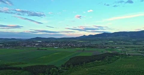 Drone shot over green meadows before sunset in Hungary Stock Footage 139877684
