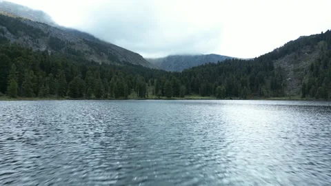Drone shot over the lake a meter from the water Stock Footage 227126534