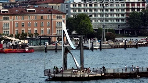 Drone shot over Life Electric sculpture on Como lake, Italy Stock Footage 247664933