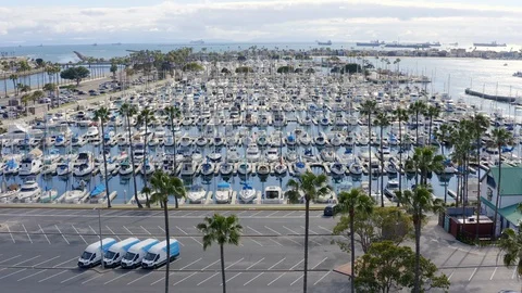 Drone shot over Long Beach boat harbor near 2nd and PCH Stock Footage 128978953