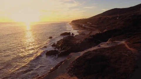 Drone shot over Malibu beach rocks by the ocean Rec709 Stock Footage 84537584
