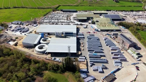 Drone Shot Over Masonry Block Factory with Palletised Building Materials Stock Footage 343912300