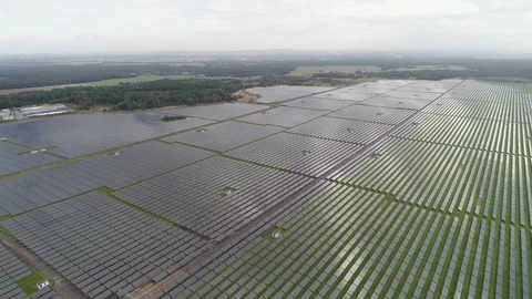 Drone shot over massive solar panel field, renewable energy Germany Видео 85854211
