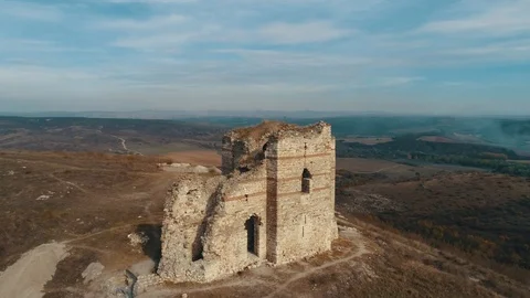 Drone shot over Medieval Byzantine fortress Bukelon, village Matochina, Bulgaria Видео 119719456