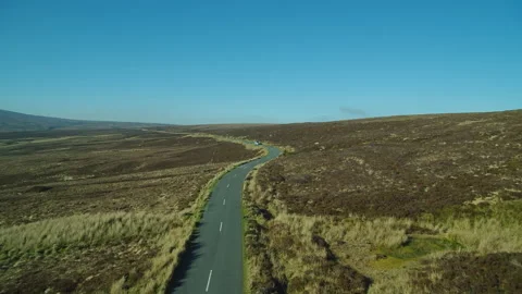 Drone Shot Over A Mountain Road And Car Driving By Stock Footage 131720738