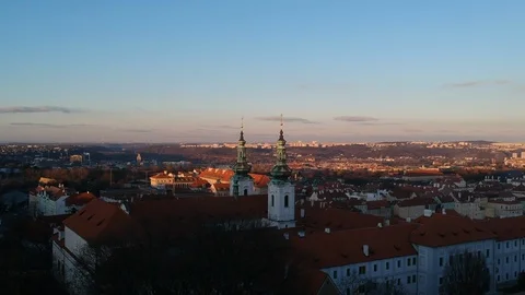 Drone shot over Prague at dusk Stock Footage