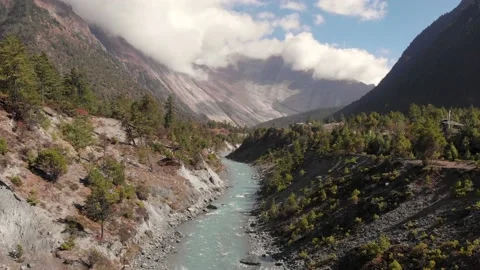 Drone shot over river in lower Pisang, Nepal Stock Footage 132344063
