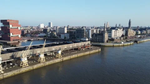 Drone shot over the river Scheldt of old cranes, MAS museum and the loodswezen Video stock 160285428