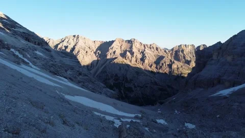 Drone shot over a rough mountain panorama in the morning Video stock 159437229