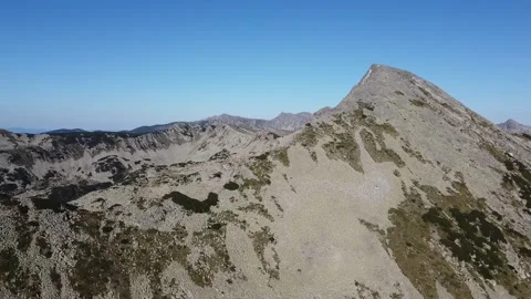 Drone Shot Over Rugged Pirin Ridge on a Clear Autumn Day Stock Footage 332012058
