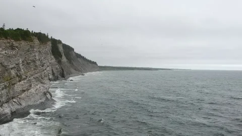 Drone shot over sea cliffs in Cap Bon Ami National Park, Québec, Canada Stock Footage 179019492