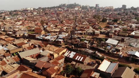 Drone shot over the slums of Uganda, poverty and poor one-storey buildings. Stock Footage 201264802
