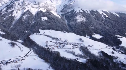 Drone shot over a small mountain town in Alpes France. Cinematic Smooth footage Stock Footage 194568790