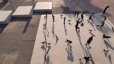 Drone shot over a statue of people Stock Footage 55867824