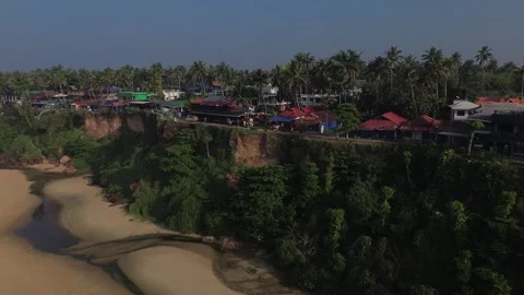 Drone shot overhead varkala beach India kerala Drone showing Varkala cliff Stock Footage 256652878