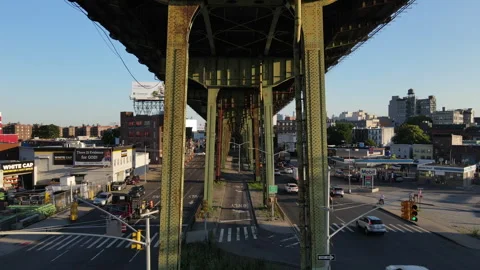 Drone shot of an overpass cutting through Brooklyn Stock Footage 247206522