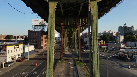 Drone shot of an overpass cutting through Brooklyn Stock Footage 247206606