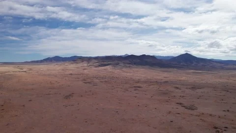Drone shot panning right to left over the New Mexico desert on a sunny day Stock Footage 171527324
