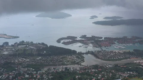 Drone shot: Panoramic view of Victoria city and Eden Island on Mahe island 動画素材 106496348