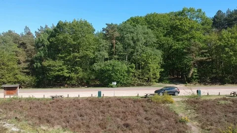 Drone shot, parking lot in forest Video stock 89498451