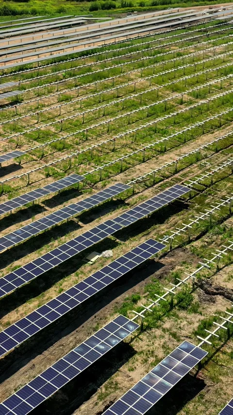 Drone Shot of Photovoltaic Array Construction on Rural Land Stock Footage 337137773