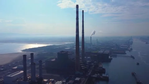 Drone shot of Poolbeg Strand iconic power station in Dublin Stock Footage 272607655