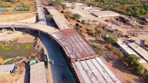 Drone shot progress on a partially built overpass Vídeo Stock 299786171