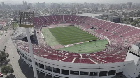 Drone Shot Pulling Back From South Stand Over Estadio Nacional de Chile Stock Footage 344913952