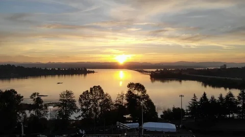 Drone shot pushing into a sunset Stock Footage 102132079