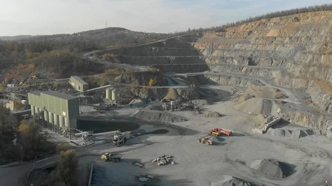 Drone shot of quarry. Open pit mine where stone, rock and sand is excavated Stock Footage 122571536